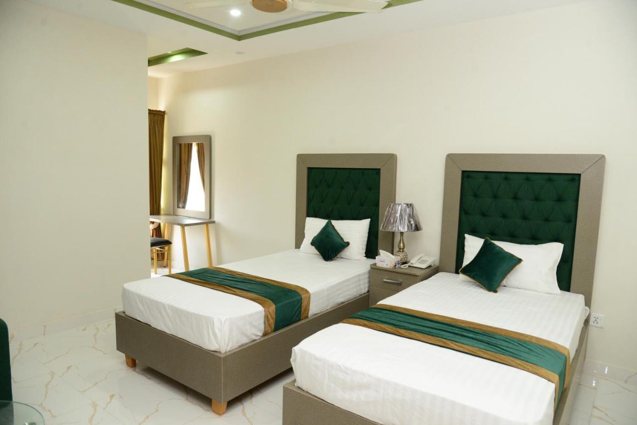 Hotel Deluxe Lahor Dış mekan fotoğraf